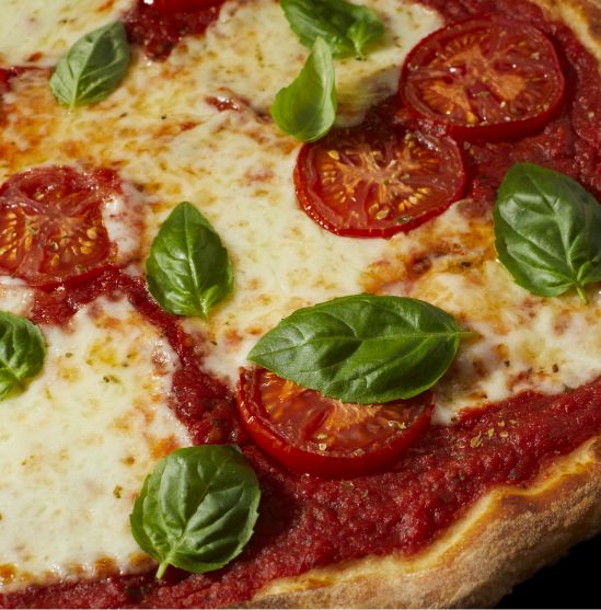 Margarita pizza close up with Bacio cheese
